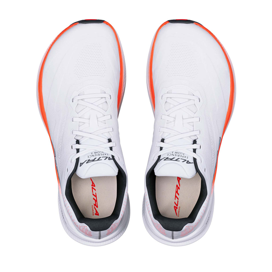 The uppers of a pair of Altra Men's Experience Flow 3 Running Shoes in the White/Coral colourway.