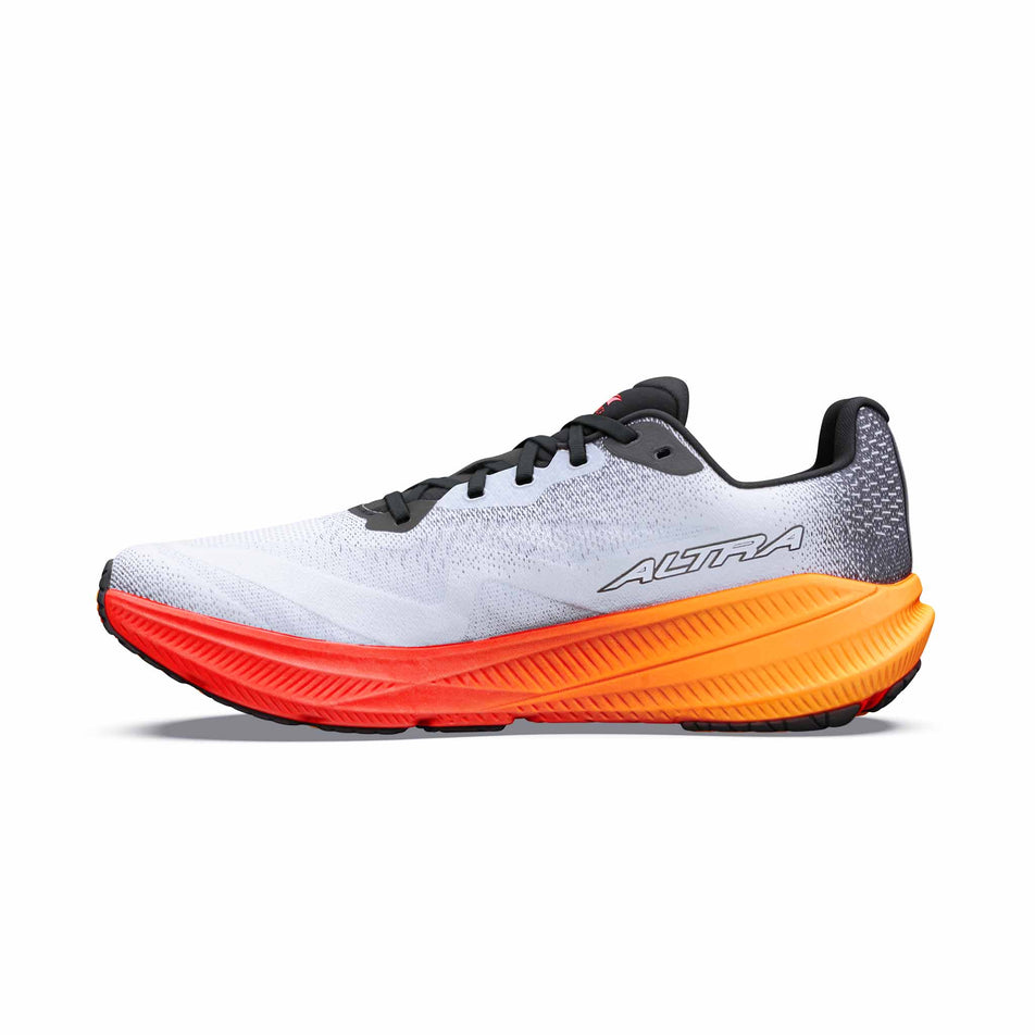 Medial view of the right shoe from a pair of Altra Men's Experience Flow 3 Running Shoes in the White/Black/Orange Pop colourway.