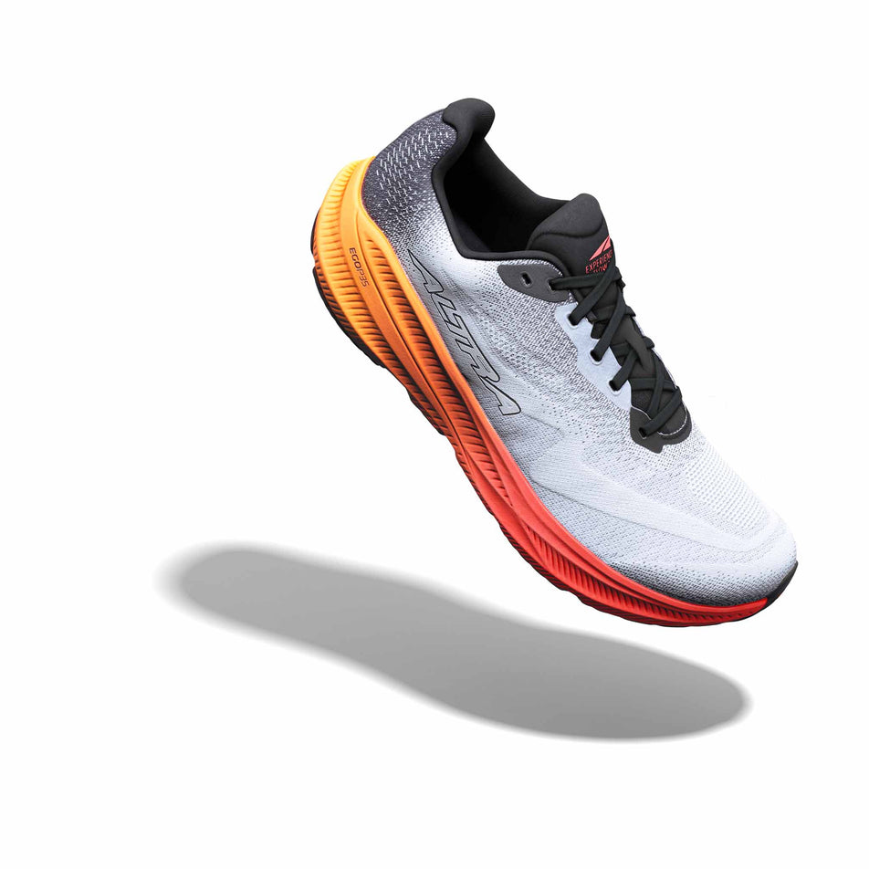The right shoe from a pair of Altra Men's Experience Flow 3 Running Shoes in the White/Black/Orange Pop colourway.