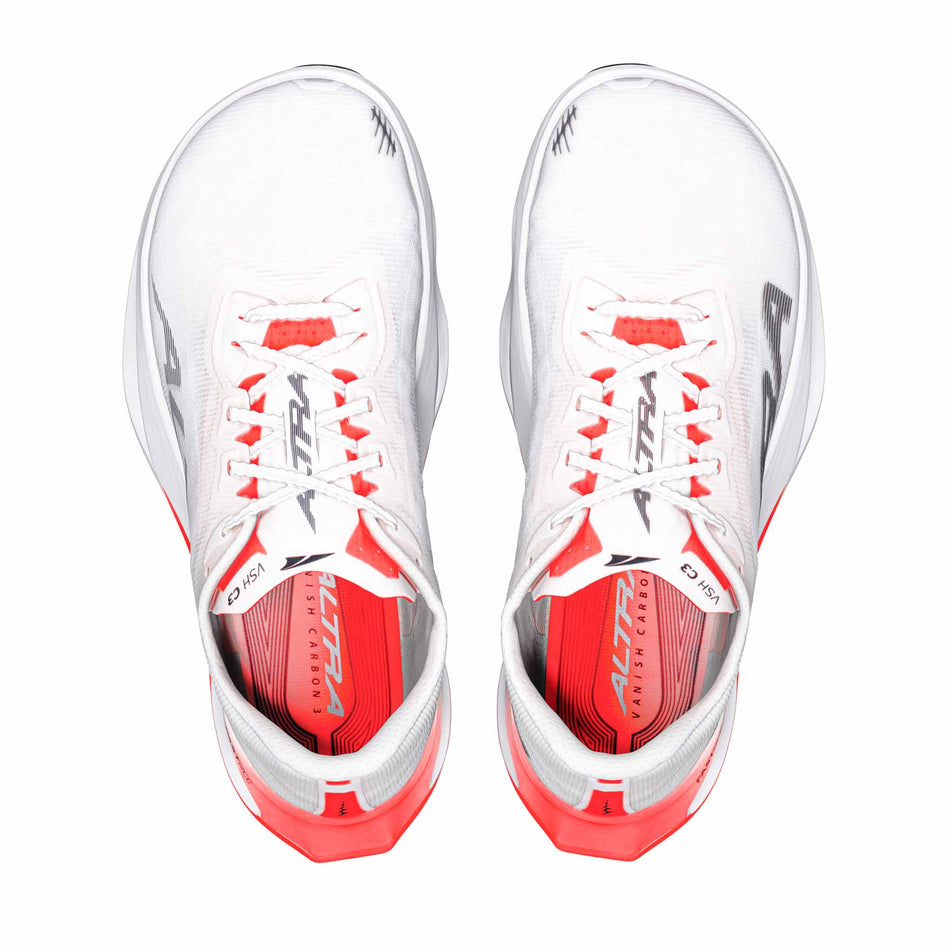 The uppers of a pair of Altra Men's Vanish Carbon 3 Running Shoes in the White/Black/Fiery Coral colourway.