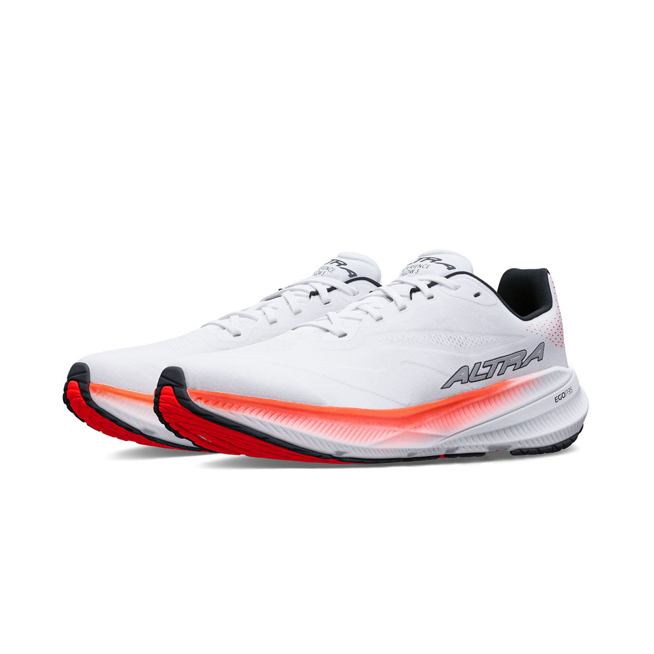 A pair of Altra Women's Experience Flow 3 Running Shoes in the White/Coral colourway.