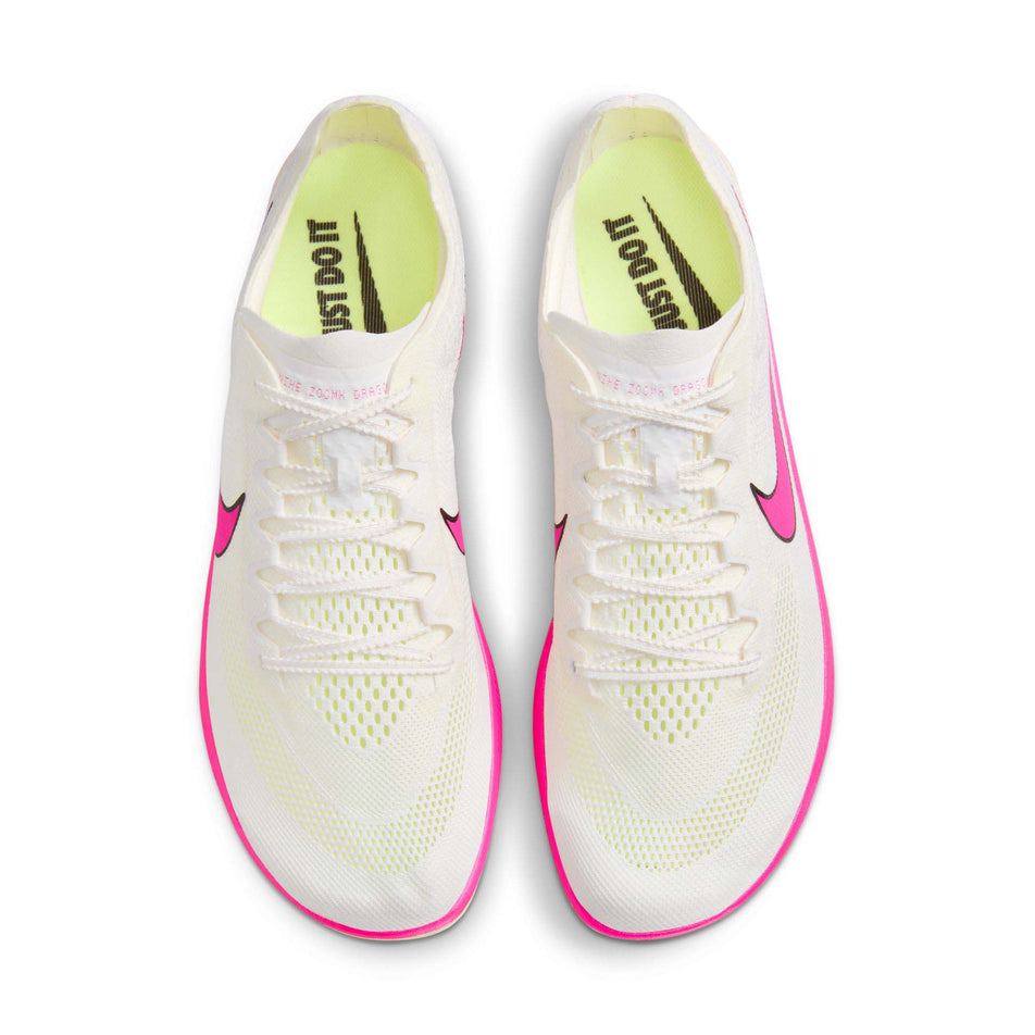 The uppers on a pair of Nike Unisex ZoomX Dragonfly Track & Field Distance Spikes in the Sail/Fierce Pink-LT Lemon Twist colourway (8139978014882)