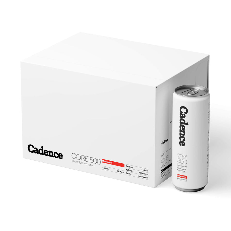 A box of Cadence Core Hydration Drink Cans in the Melonberry flavour, and a single can sitting beside the box. (8778450272418)