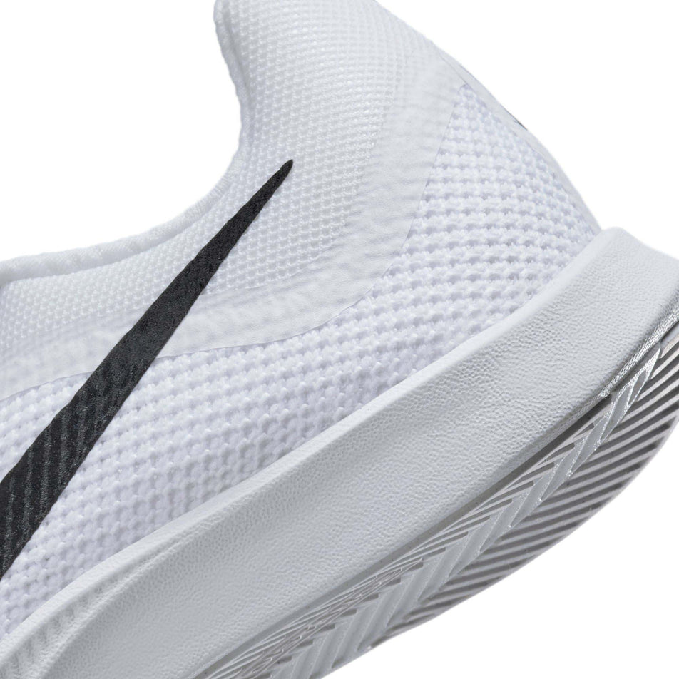Lateral side of the back of the left shoe from a pair of Nike Unisex Rival Distance Track & Field Distance Spikes in the White/Black-Metallic Silver colourway (8049556324514)