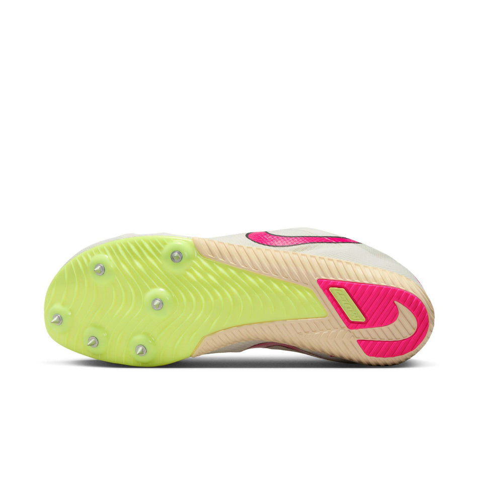 Outsole of the left shoe from a pair of Nike Unisex Rival Multi Track & Field Multi-Event Spikes in the Sail/Fierce Pink-LT Lemon Twist colourway (8139969757346)