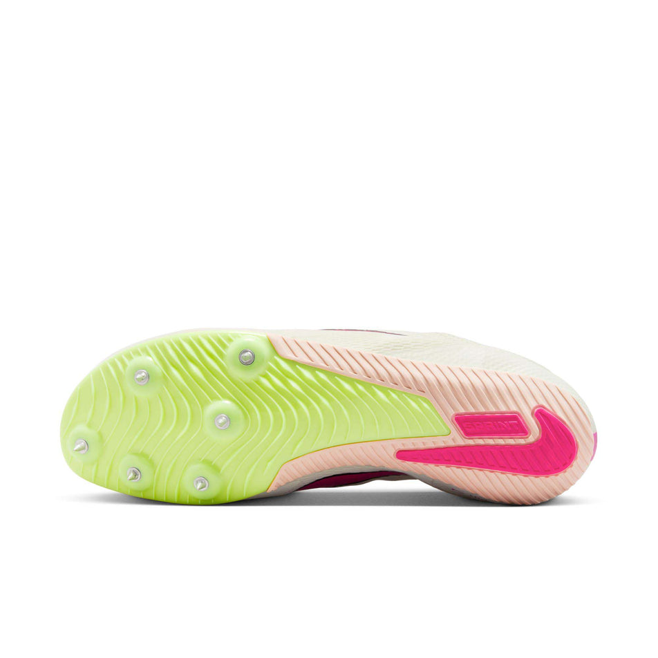 Outsole of the left shoe from a pair of Nike Unisex Rival Sprint Track & Field Sprinting Spikes in the Sail/Fierce Pink-LT Lemon Twist colourway (8139960189090)