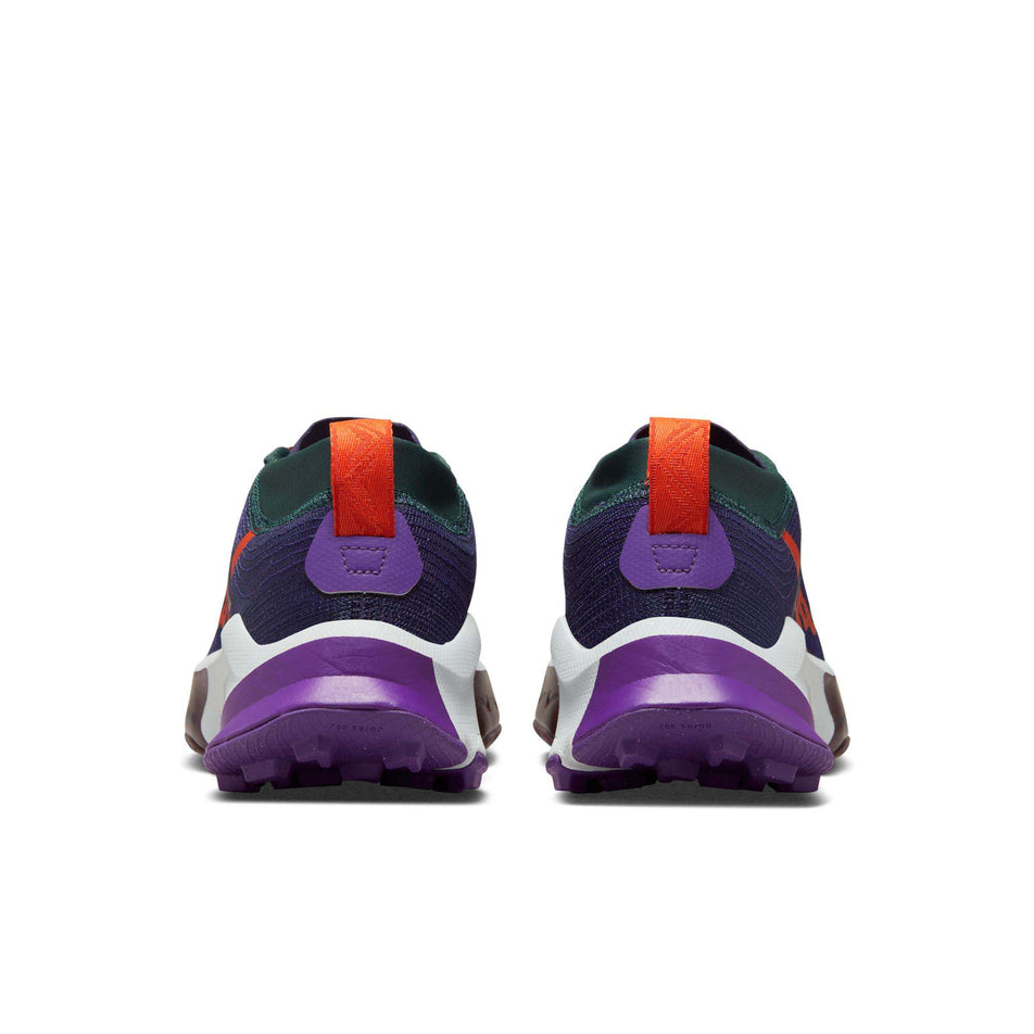 The back of a pair of Nike Women's Zegama Trail Running Shoes in the Purple Ink/Safety Orange-Deep Jungle colourway (8049474764962)