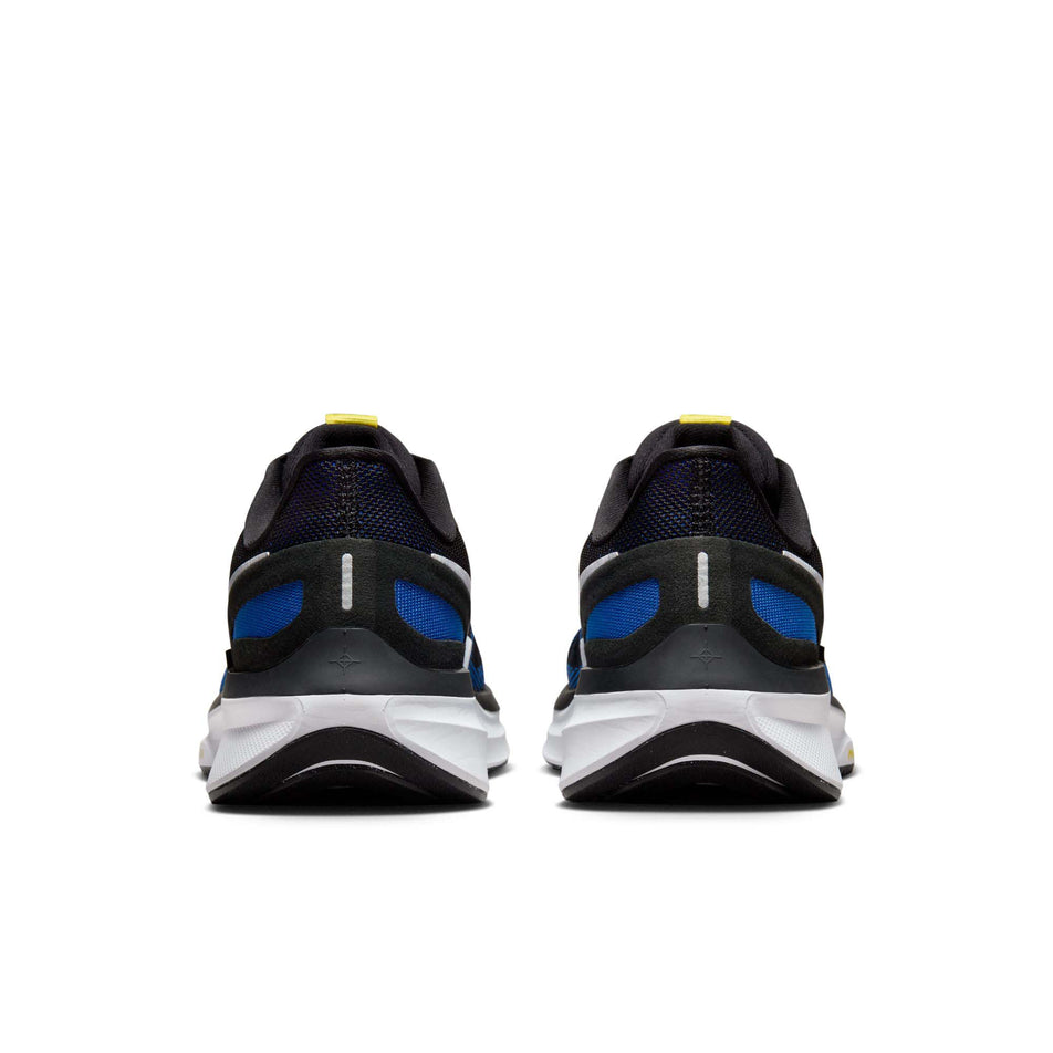 The back of a pair of Nike Men's Structure 25 Road Running Shoes in the Black/White-Racer Blue-Sundial colourway (8025956745378)