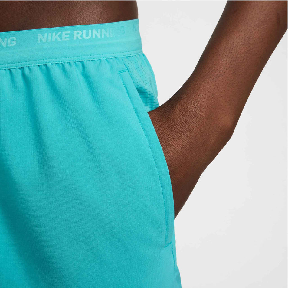 Close-up view of the left pocket on the Nike Men's Stride Dri-FIT 5