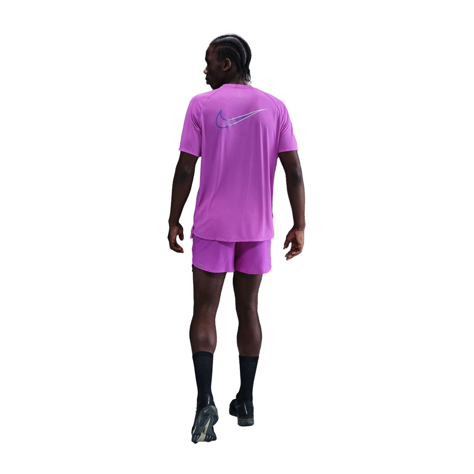 Back view of a model wearing the Nike Men's Dri-FIT Stride 5