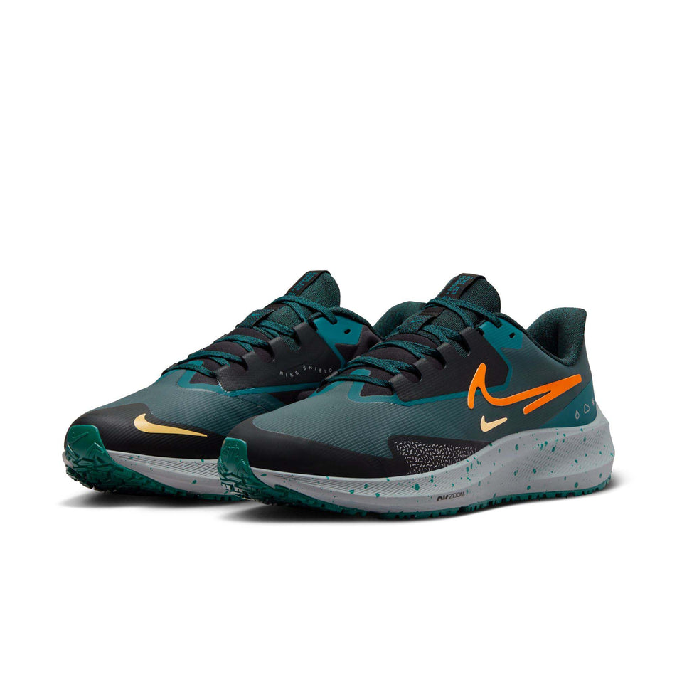 A pair of Nike Men's Pegasus 39 Shield Weatherized Road Running Shoes. Deep Jungle/Safety Orange-Geode Teal colourway. (8072700199074)