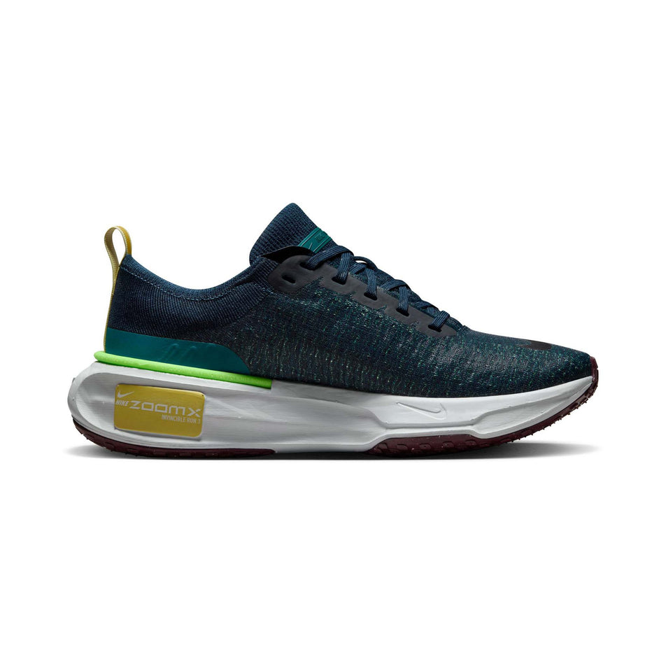 Medial side of the left shoe from a pair of Nike Men's Invincible 3 Road Running Shoes in the Armory Navy/Black-Geode Teal-Buff Gold (8073000386722)