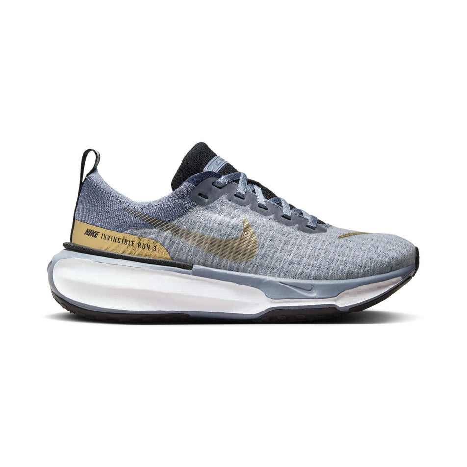 Lateral side of the right shoe from a pair of Nike  Women's Invincible 3 Road Running Shoes in the Ashen Slate/Metallic Gold-Diffused Blue colourway (8070590333090)
