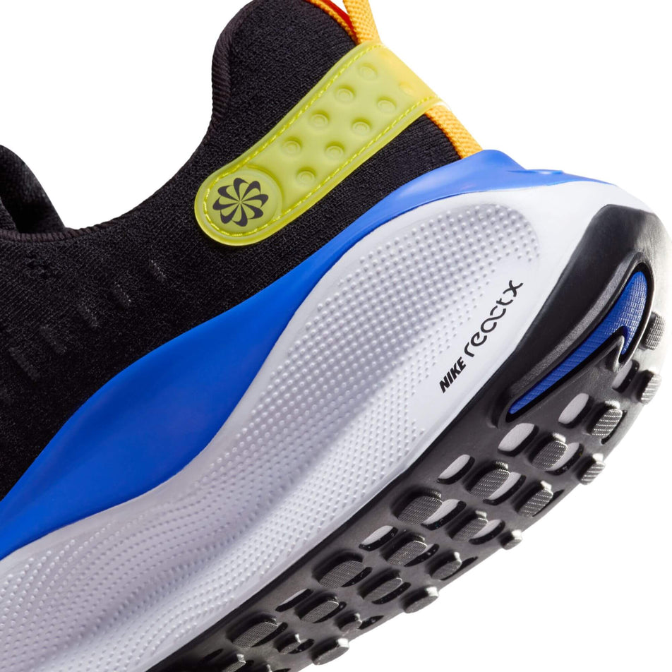Lateral side of the back of the left shoe from a pair of Nike Men's Infinity RN 4 Road Running Shoes in the Black/White-Anthracite-Racer Blue colourway (7979473436834)
