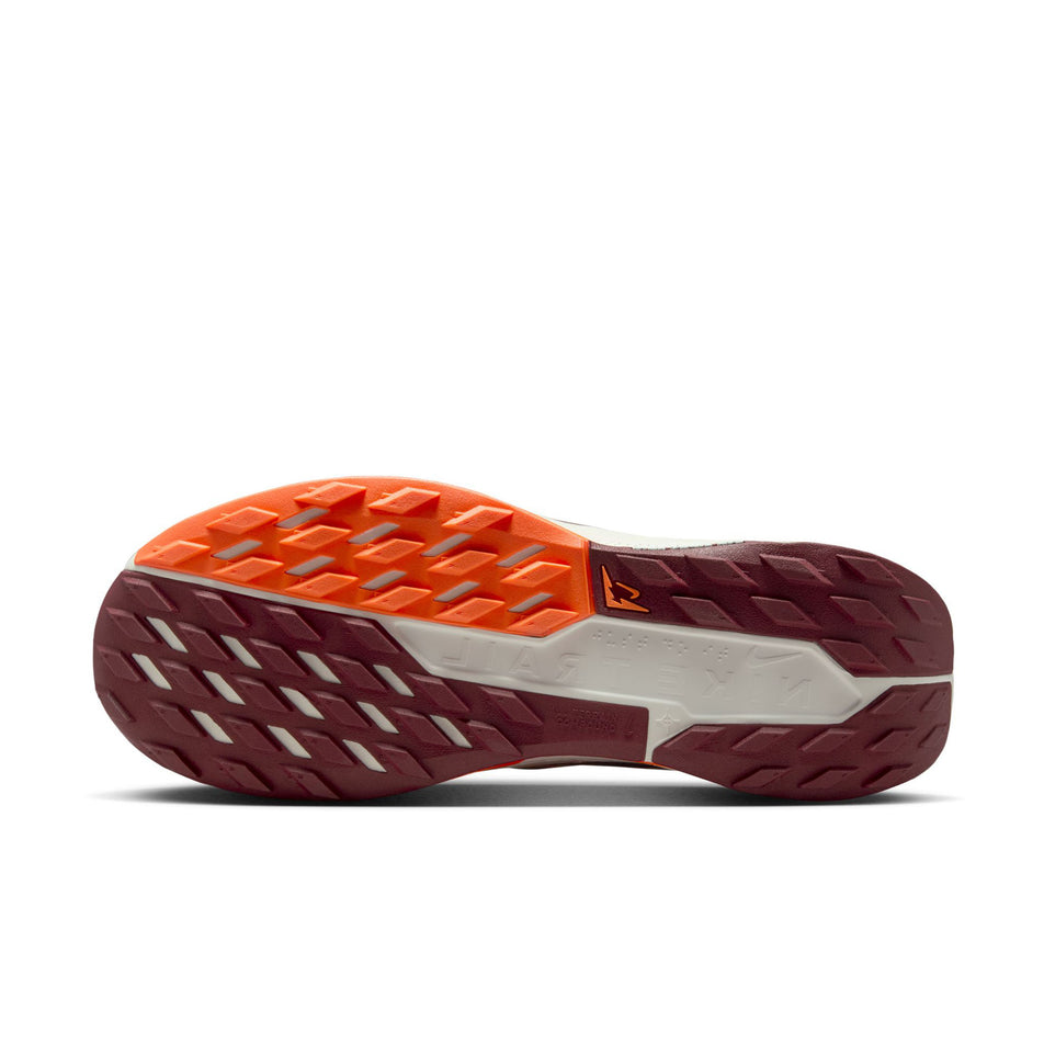 The outsole of the left shoe from a pair of Nike Men's Pegasus Trail 5 Running Shoes in the Silt Red/Dark Team Red-Hyper Crimson colourway. (8724571488418)