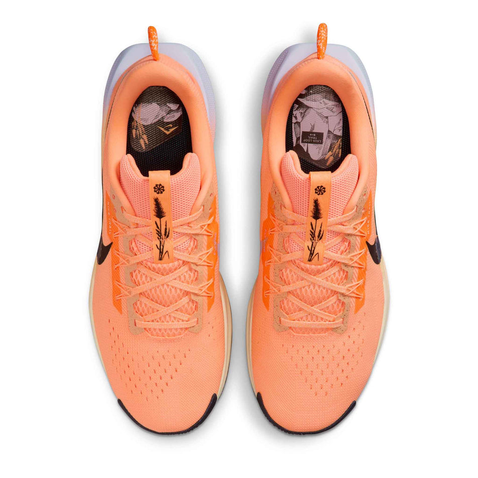 The uppers of a pair of Nike Men's Pegasus Trail 5 Trail Running Shoes in the Orange Pulse/Black-Ghost-Alabaster colourway.(8754907578530)