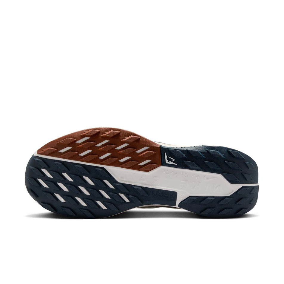 The outsole of the left shoe from a pair of Nike Women's Pegasus Trail 5 Running Shoes in Summit White/Armory Navy-Football Grey colourway. (8615658487970)