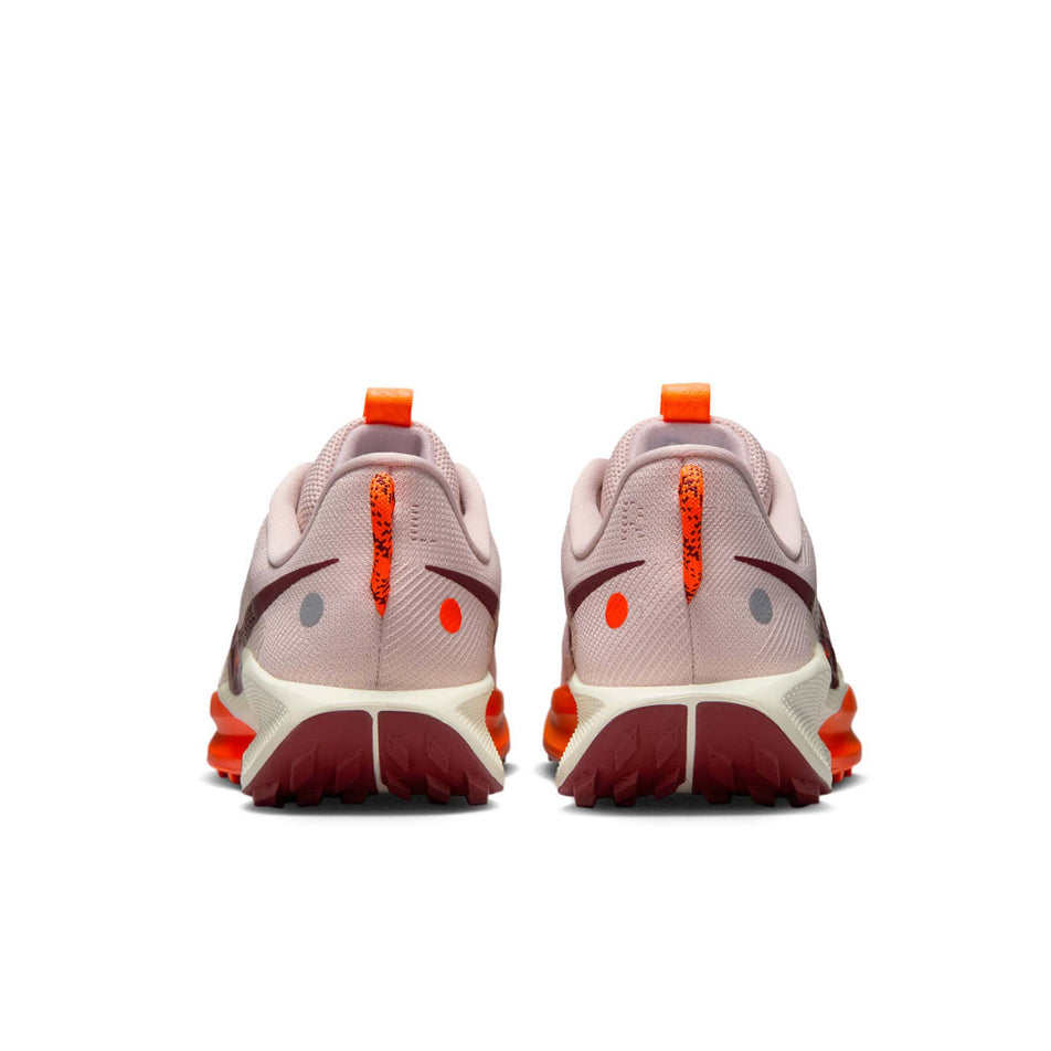 The back of a pair of Nike Women's Pegasus Trail 5 Running Shoes in the Silt Red/Dark Team Red-Hyper Crimson colourway. (8686796079266)