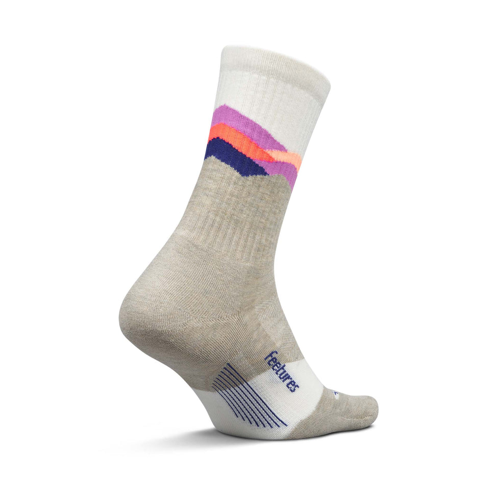 Medial view of the left sock from a pair of Feetures Unisex Trail Max Cushion Mini Crew in the Mountain High Cream colourway.