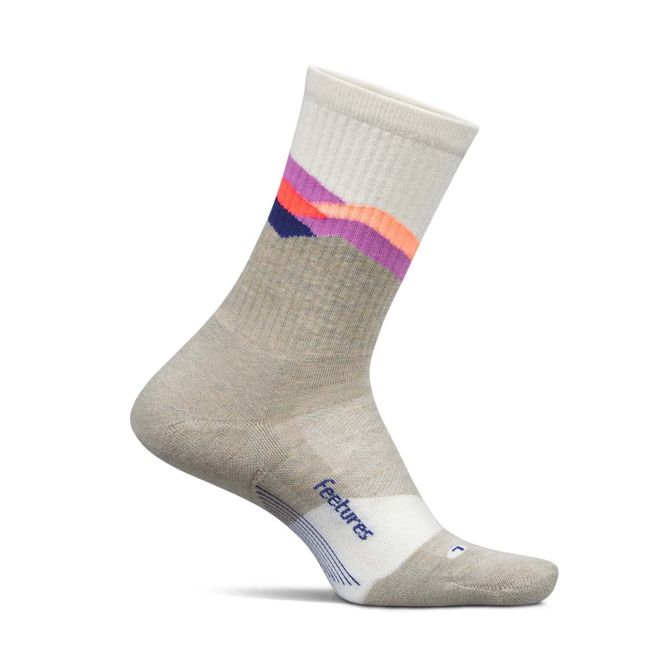 Medial view of the left sock from a pair of Feetures Unisex Trail Max Cushion Mini Crew in the Mountain High Cream colourway.