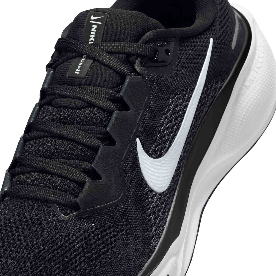 Close up of the upper of the left shoe from a pair of Nike Women's Pegasus 41 Road Running Shoes in the Black/White-Anthracite colourway. (8686780317858)