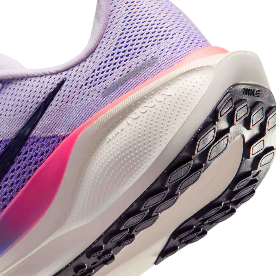 Close-up view of the rearfoot section of the left shoe from a pair of Nike Women's Pegasus 41 Road Running Shoes in the Violet Mist/Purple Dynasty-Bright Violet colourway.