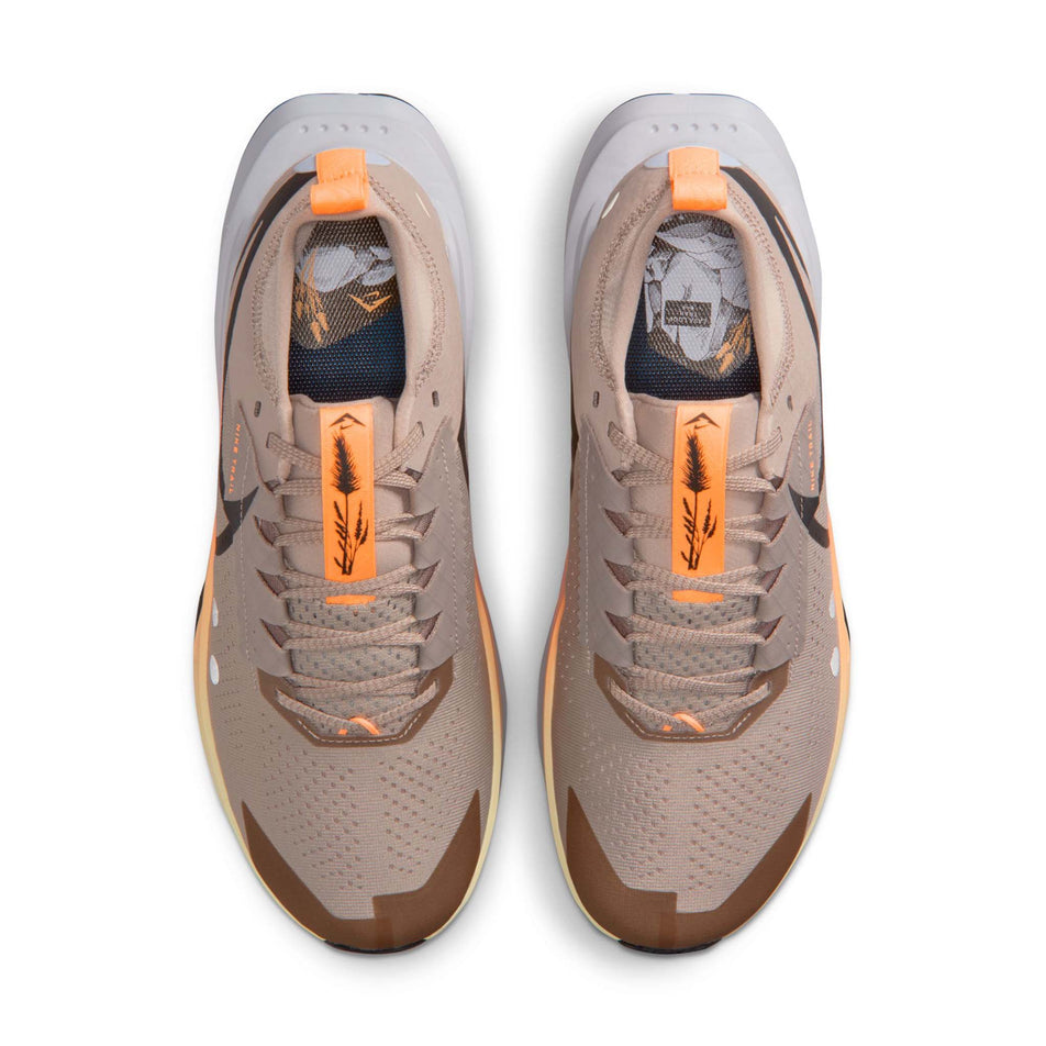 The uppers of a pair of Nike Men's Zegama Trail 2 Trail Running Shoes in the Malt/Black-Ghost-Alabaster colourway. (8754909708450)