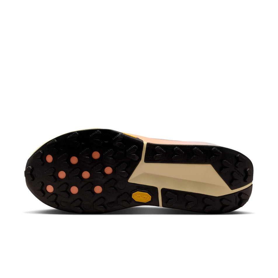 The outsole of the left shoe from a pair of Nike Men's Zegama Trail 2 Trail Running Shoes in the Malt/Black-Ghost-Alabaster colourway. (8754909708450)