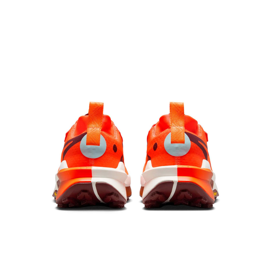 The back of a pair of Nike Men's Zegama Trail 2 Running Shoes in the Hyper Crimson/Dark Team Red-Glacier Blue colourway. (8724585021602)