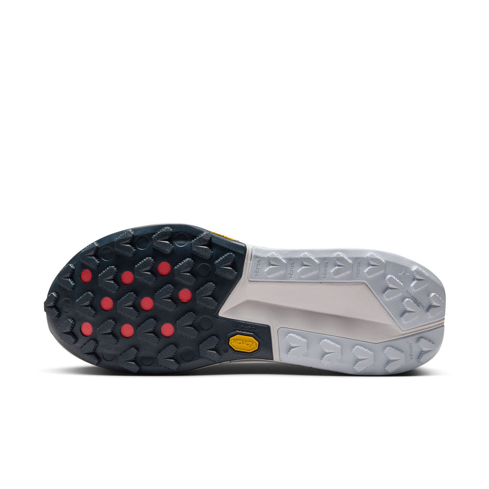 The outsole of the left shoe from a pair of Nike Women's Zegama Trail 2 Running Shoes in the Pure Platinum/White-Football Grey colourway. (8615663337634)