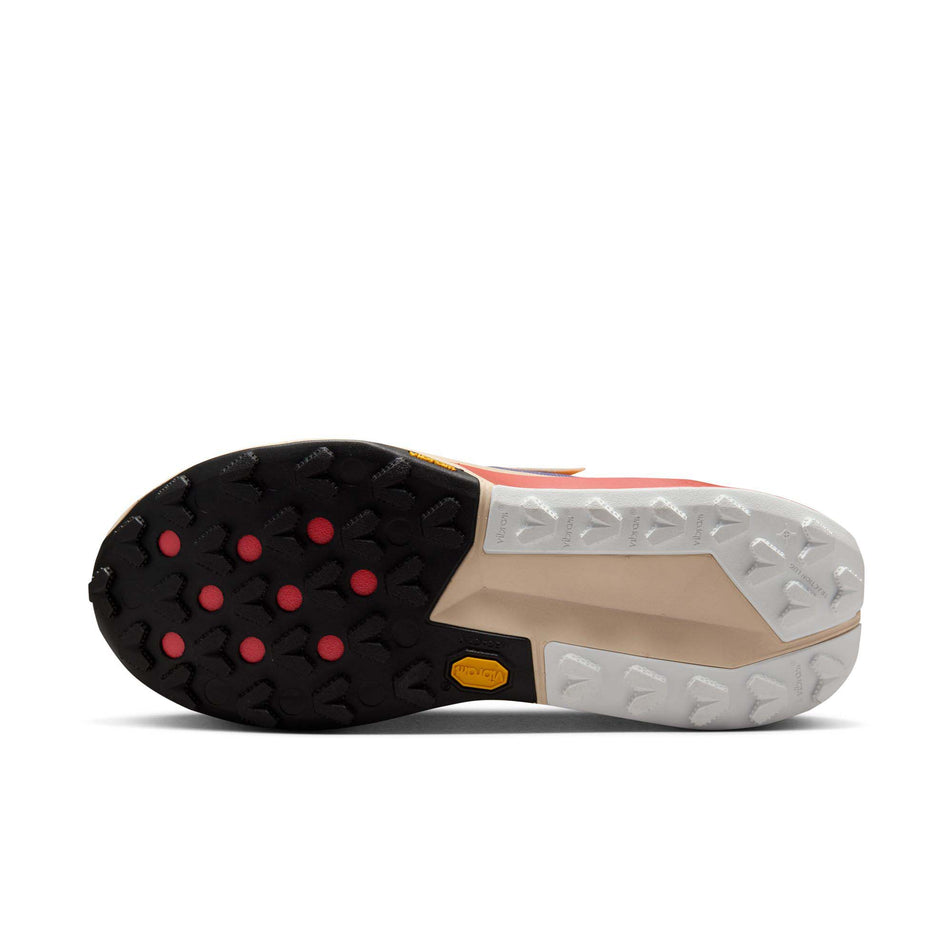Outsole of the left shoe from a pair of Nike Women's Zegama Trail 2 Trail Running Shoes in the Daybreak/White-Cosmic Clay-Sundial colourway (8283080655010)