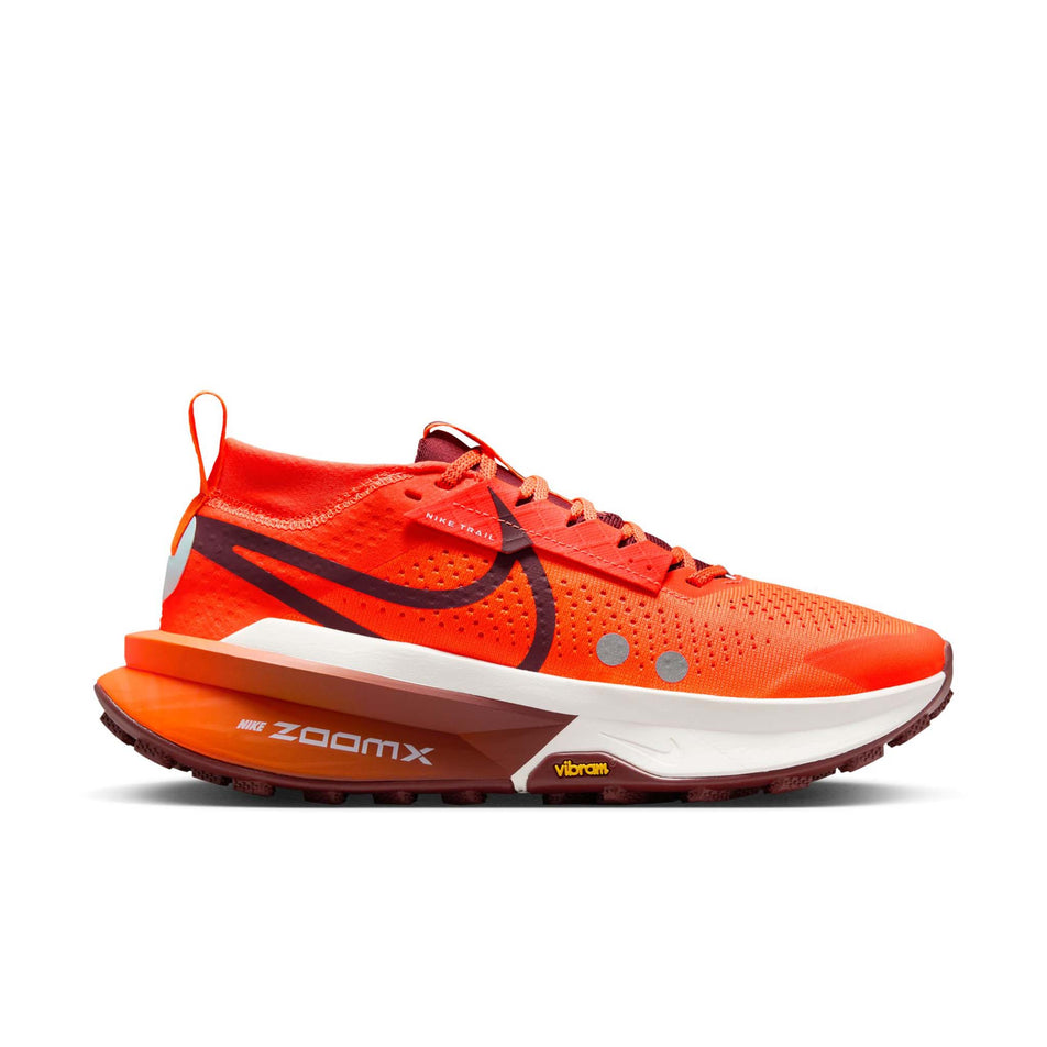 Lateral view of the right shoe from a pair of Nike Women's Zegama Trail 2 Trail Running Shoes in the Hyper Crimson/Dark Team Res-Glacier Blue colourway. (8725423882402)