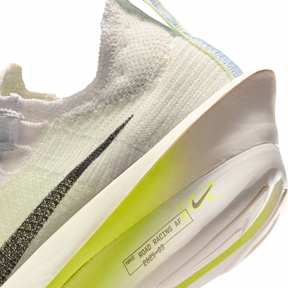 Close-up view of the rearfoot section of the left shoe from a pair of Nike Men's Alphafly 3 Road Racing Shoes in the Phantom/Sequoia-Ultralime-Citron Tint colourway.