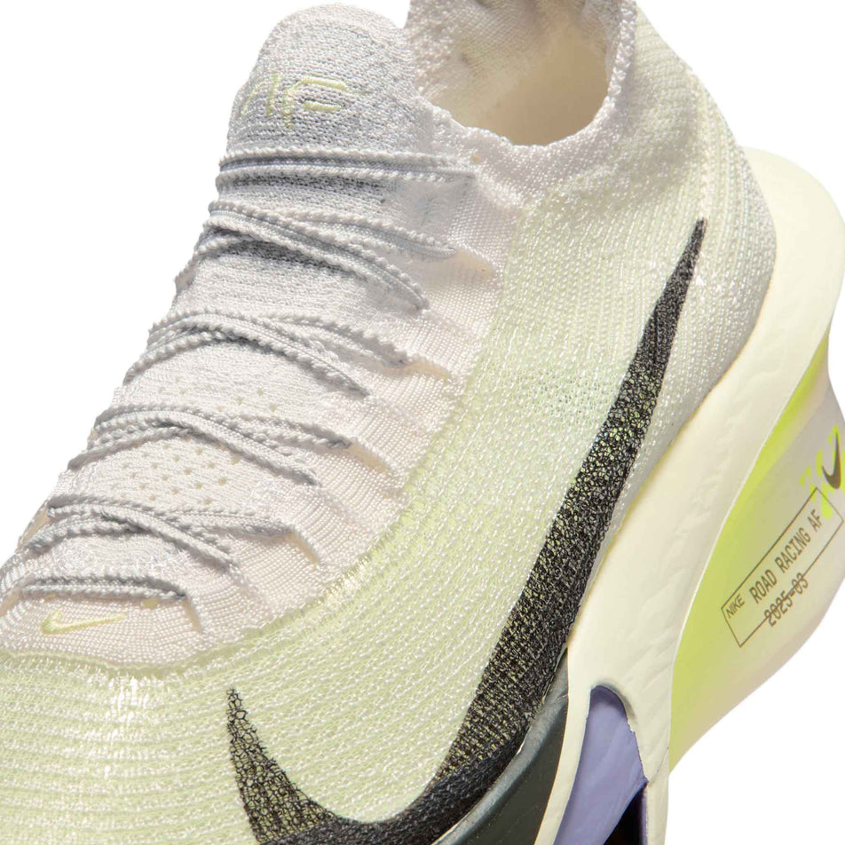 Close-up view of the upper of the left shoe from a pair of Nike Men's Alphafly 3 Road Racing Shoes in the Phantom/Sequoia-Ultralime-Citron Tint colourway.