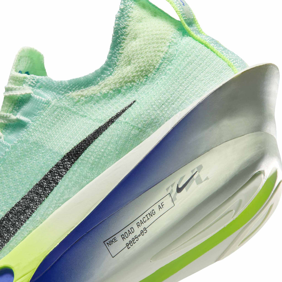 Close-up view of the rearfoot section of the left shoe from a pair of Nike Men's Alphafly 3 Road Racing Shoes in the Barely Green/Black Spruce-Volt Ting colourway.