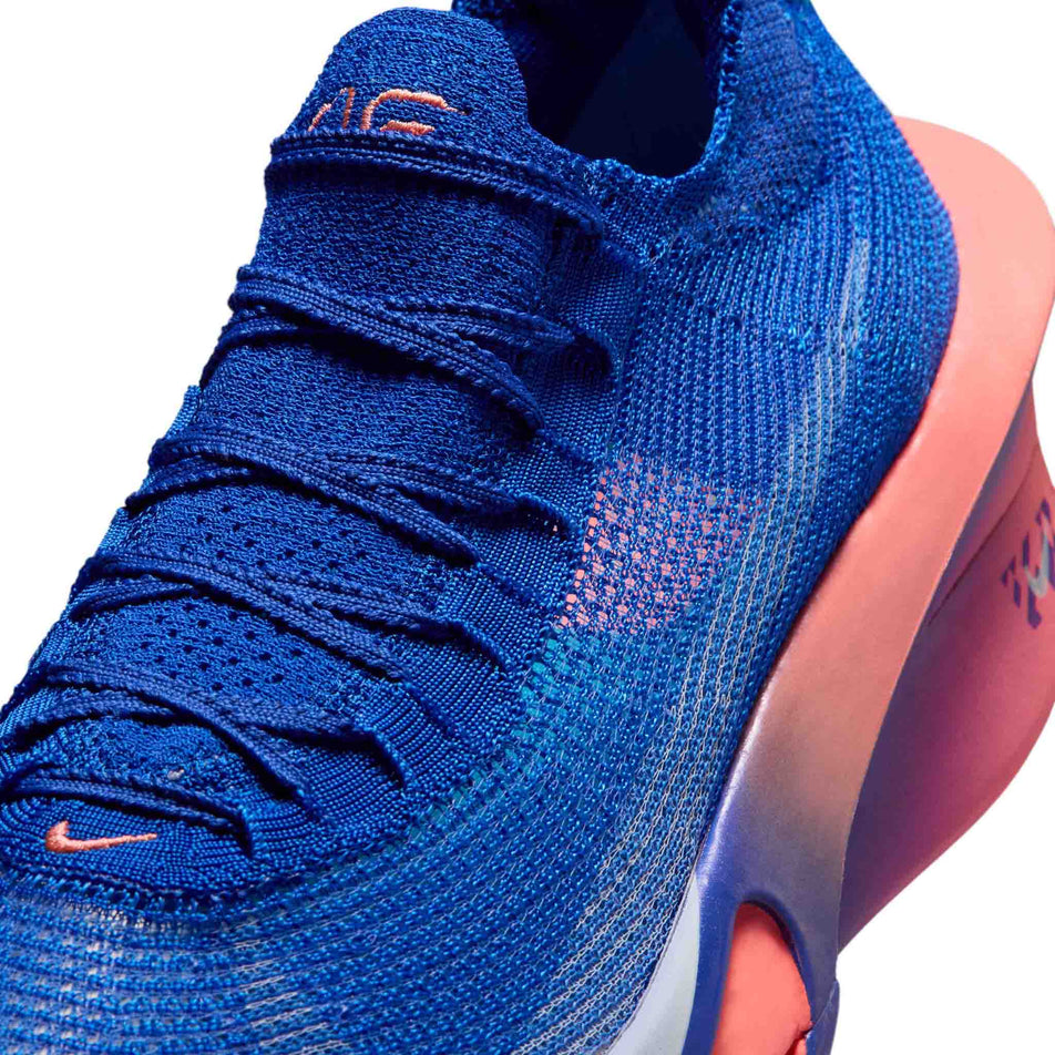 Close-up view of the upper of the left shoe from a pair of Nike Men's Alphafly 3 Road Racing Shoes in the Racer Blue/White-Atomic Blue colourway.