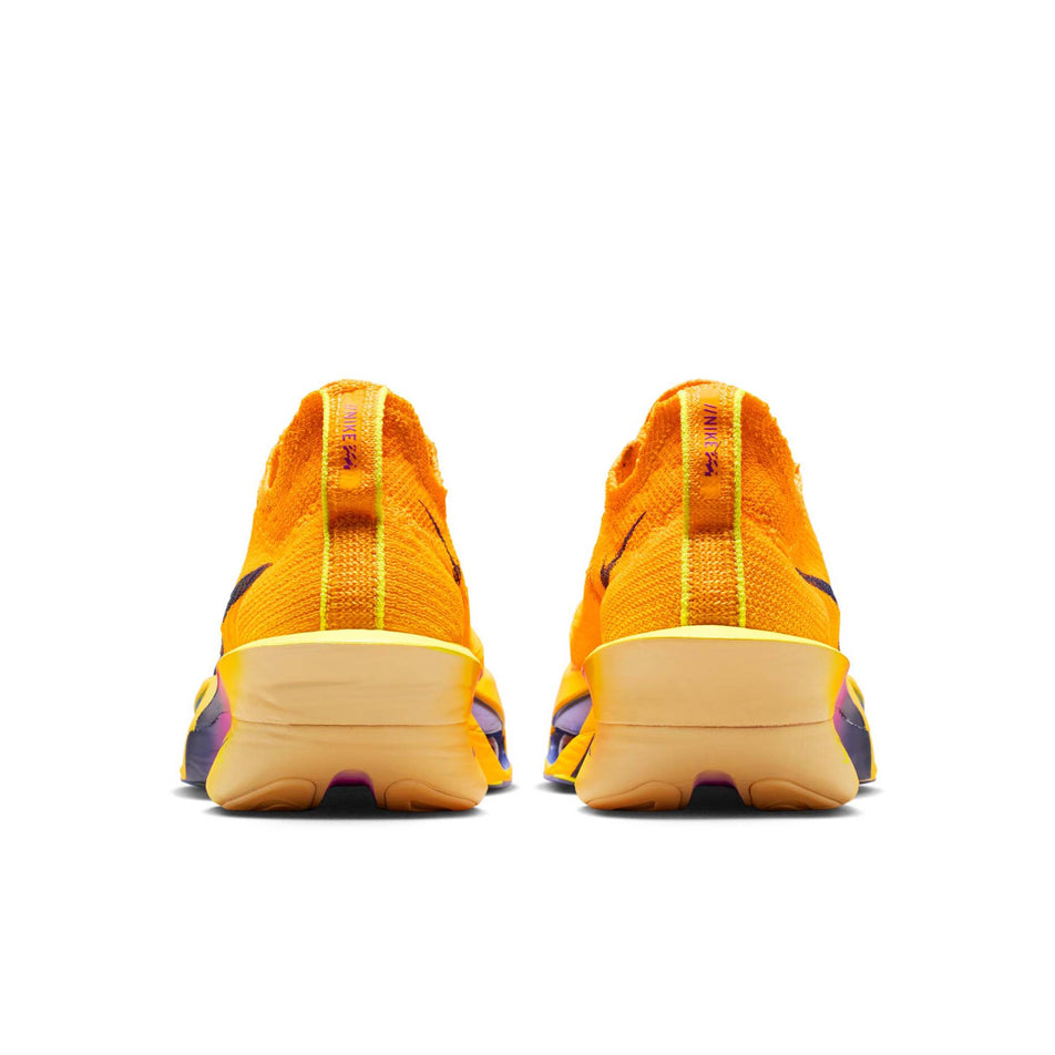 The back of a pair of Nike Women's Alphafly 3 Road Racing Shoes in the Laser Orange/Indigo Burst-Citron Pulse colourway.