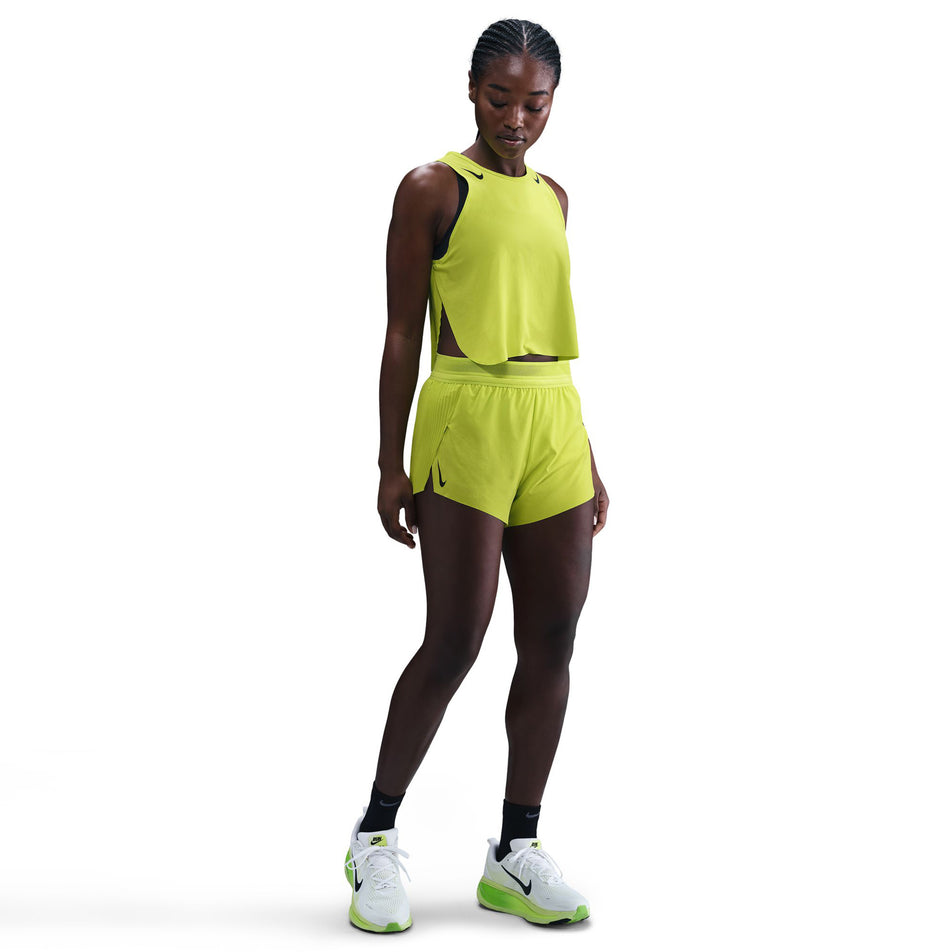 Front view of a model wearing the Nike Women's AeroSwift Dri-FIT ADV Mid-Rise Brief-Lined 3