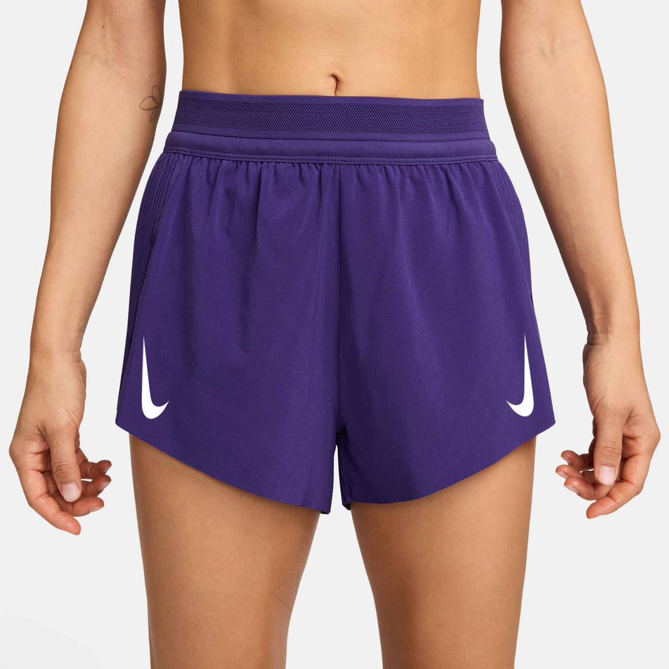 Front view of a model wearing the Nike Women's AeroSwift Dri-FIT ADV Mid-Rise Brief-Lined 3