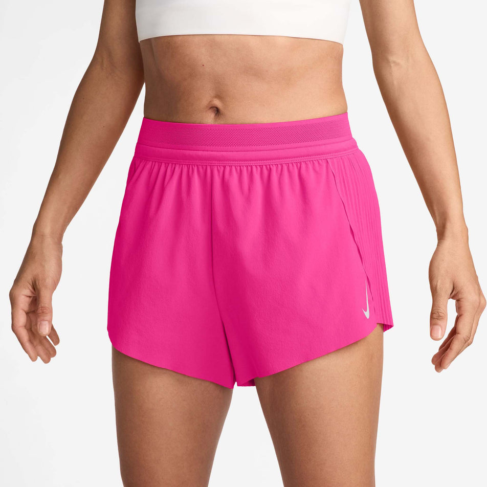 Front view of a model wearing the Nike Women's AeroSwift Dri-FIT ADV Mid-Rise Brief-Lined 3