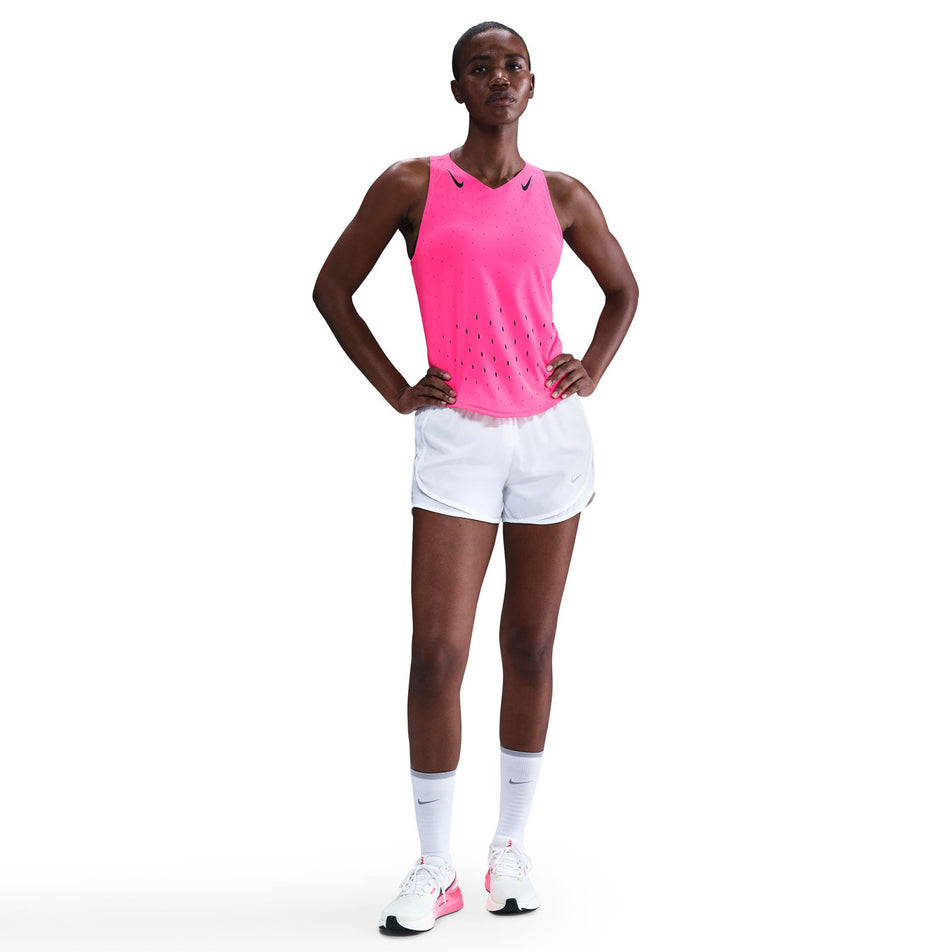 Front view of a model wearing the Nike Women's AeroSwift Dri-FIT ADV Running Singlet in the Hyper Pink/Black colourway. (8692847444130)