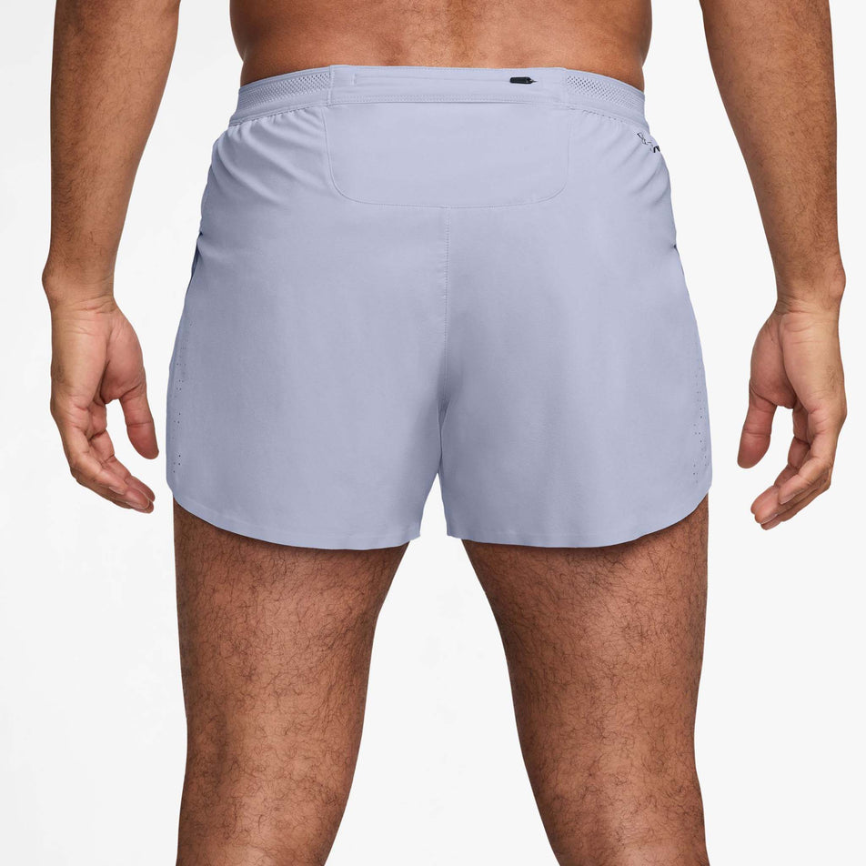 Back view of a model wearing the Nike Men's AeroSwift Dri-FIT ADV 4