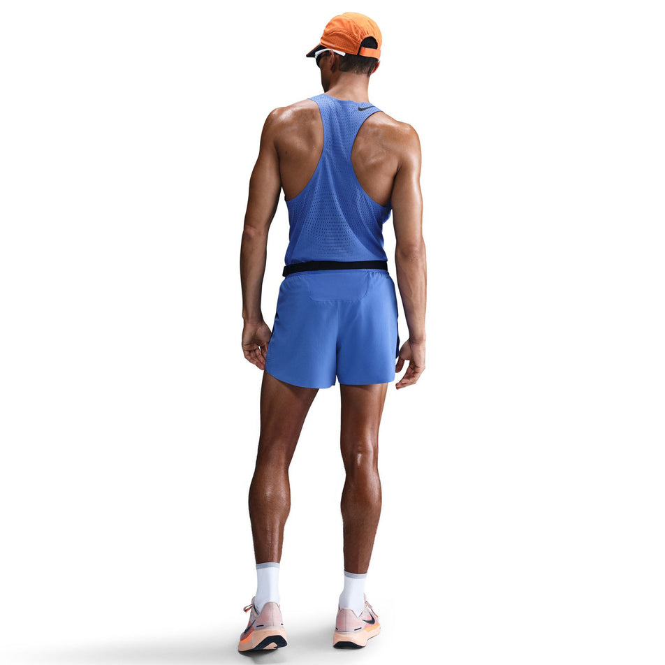 Back view of a model wearing a pair of Nike Men's AeroSwift Dri-FIT ADV 4