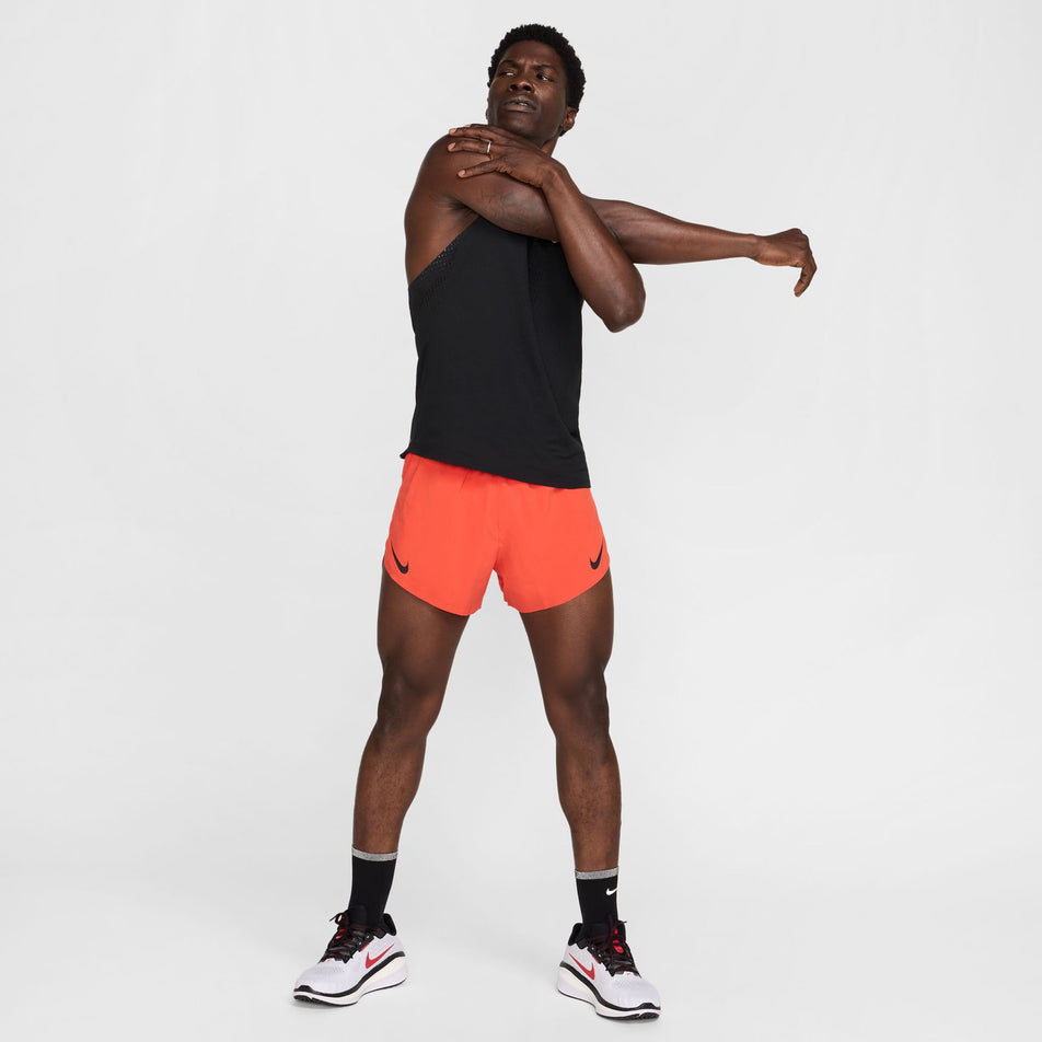 Front view of a model wearing the Nike Men's AeroSwift Dri-FIT ADV 4