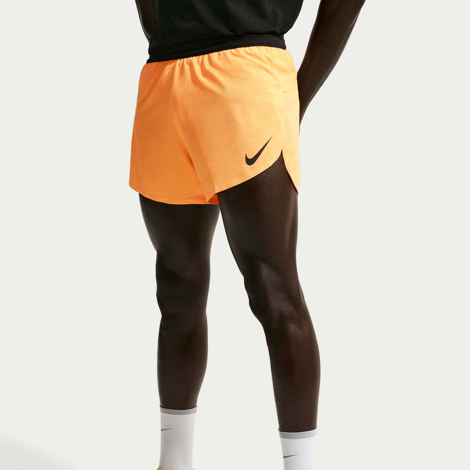 Front view of a model wearing the Nike Men's AeroSwift Dri-FIT ADV 4