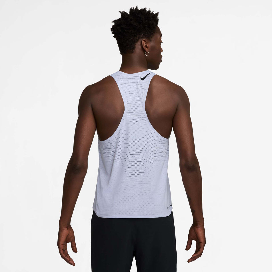 Back view of a model wearing the Nike Men's AeroSwift Dri-FIT ADV Running Singlet in the Ghost/Black colourway. (8710799949986)