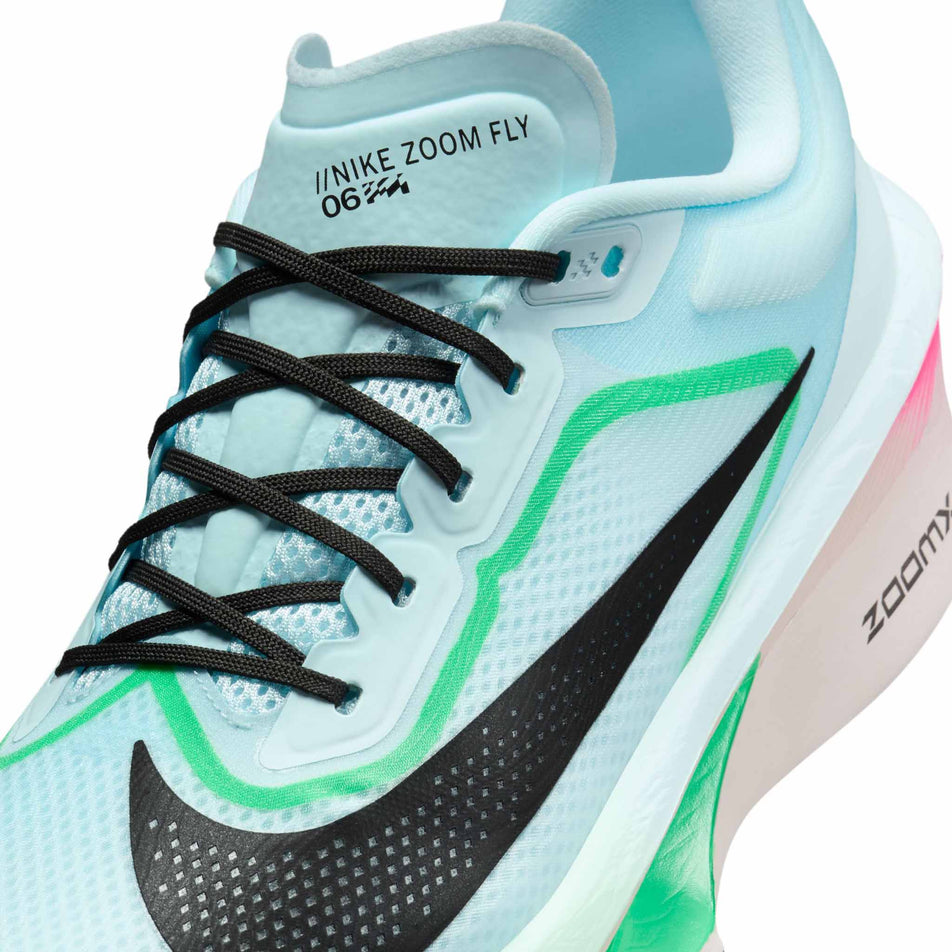 Close up of the upper of the left shoe from a pair of Nike Men's Zoom Fly 6 Road Running Shoes in the Glacier Ice/Black-Hyper Pink-Green Shock colourway. (8683266441378)