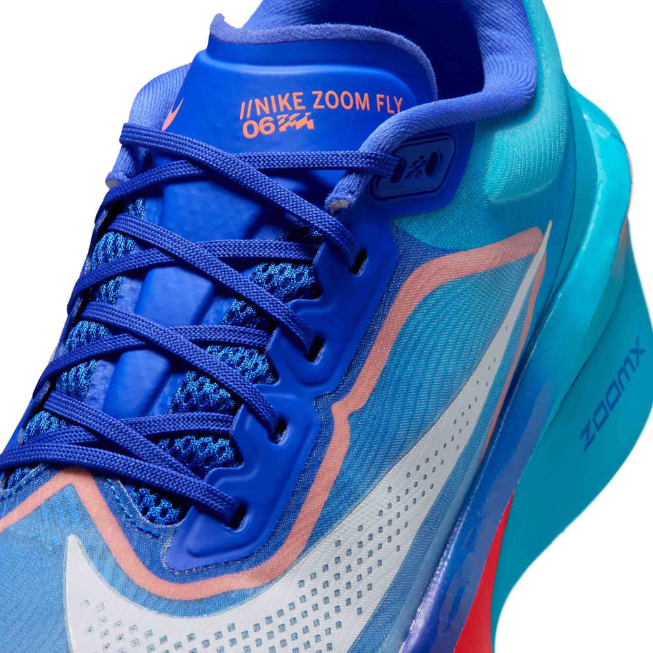 Close-up view of the upper of the left shoe from a pair of Nike Men's Zoom Fly 6 Road Running Shoes in the Racer Blue/White-Blue Lightning colourway.