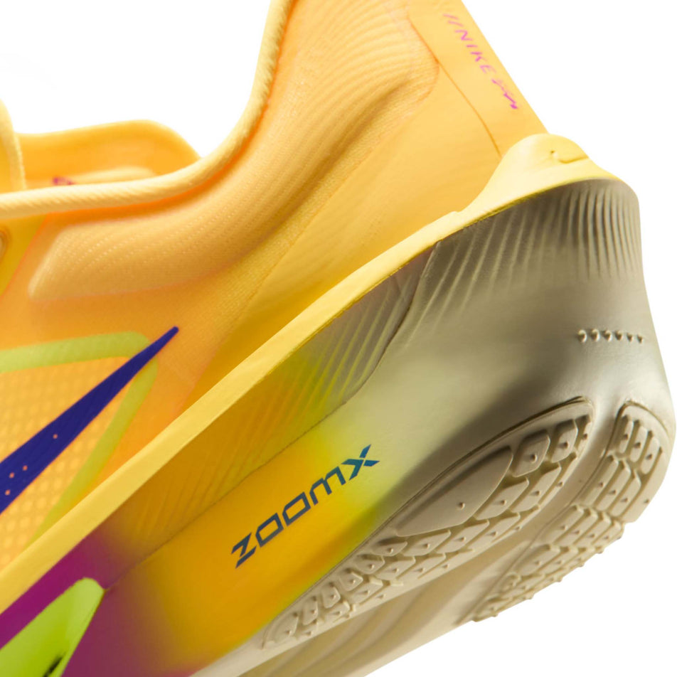 Close-up view of the rearfoot section of the left shoe from a pair of Nike Men's Zoom Fly 6 Road Running Shoes in the Citron Pulse/Indigo Burst-Volt Ice colourway.