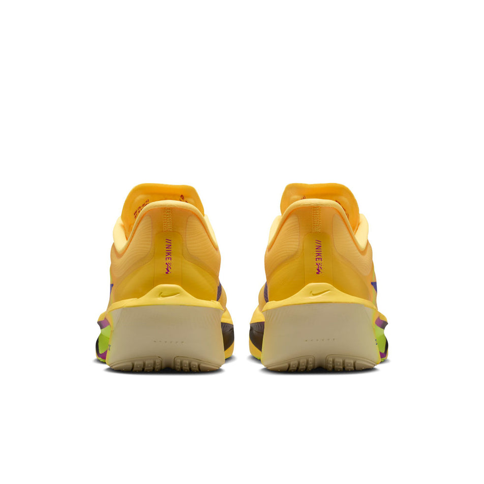 The back of a pair of Nike Men's Zoom Fly 6 Road Running Shoes in the Citron Pulse/Indigo Burst-Volt Ice colourway.